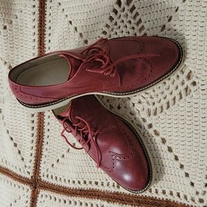 Men's wingtip. Dark red.